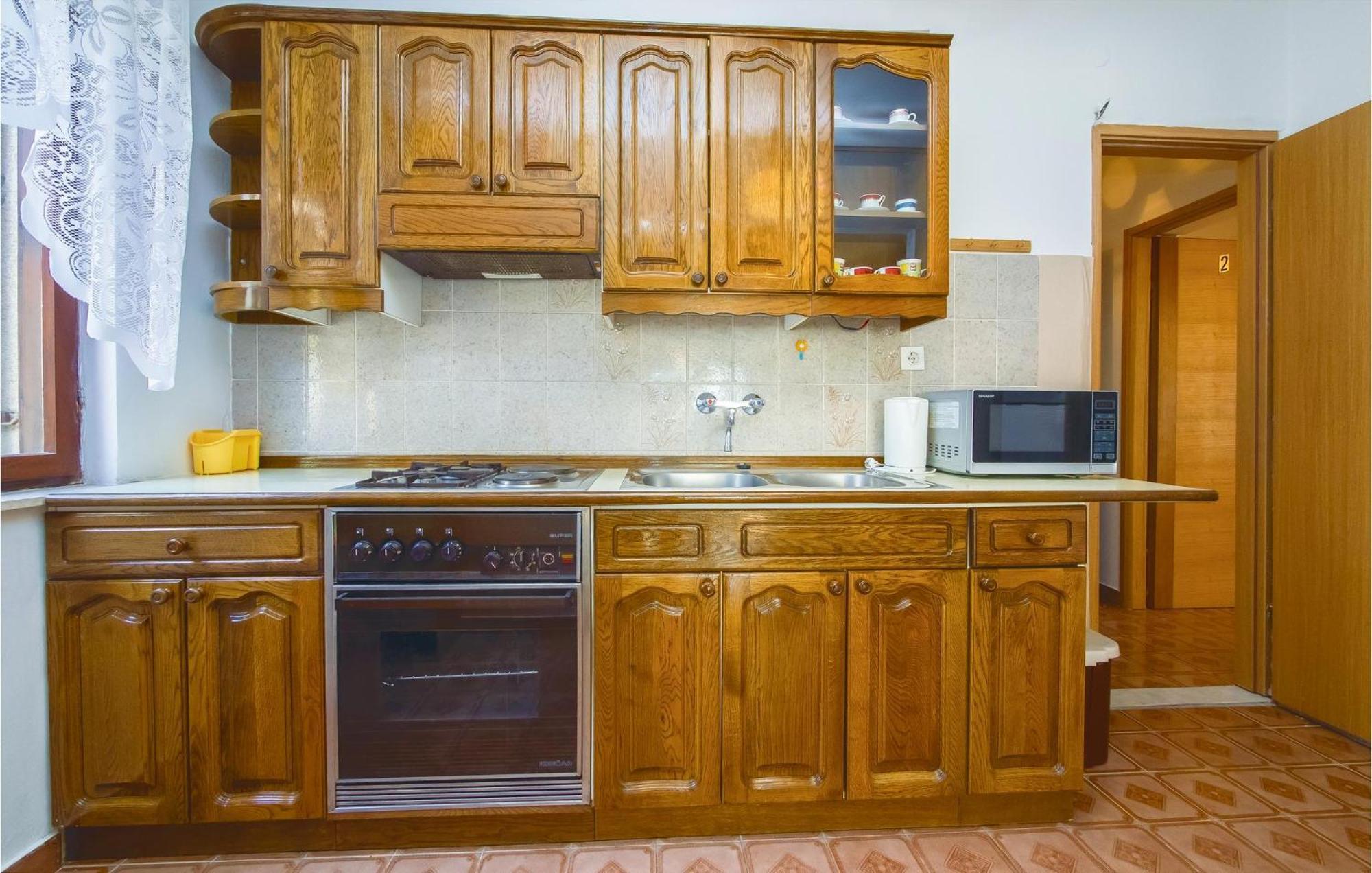 Lovely Apartment In Podstrana With Kitchen Exterior photo